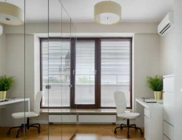 Picture of an office with some mirror panels