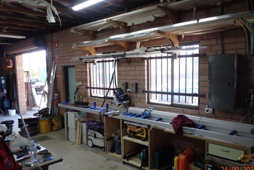 Glazier workshop with cutting tools